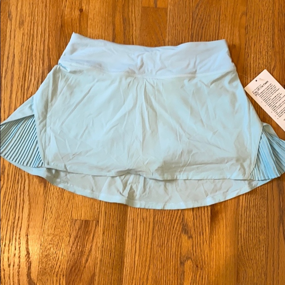 Lululemon play off the pleats skirt.